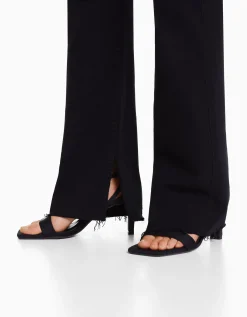 BERSHKA Jeans confort abertura lateral Negro Sale